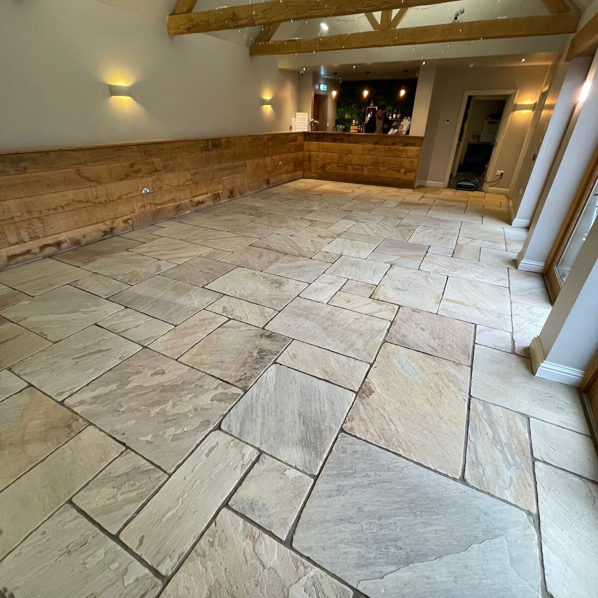 GREEN MAN RESTORES 'BLACKTOP' FLOOR WITH LTP